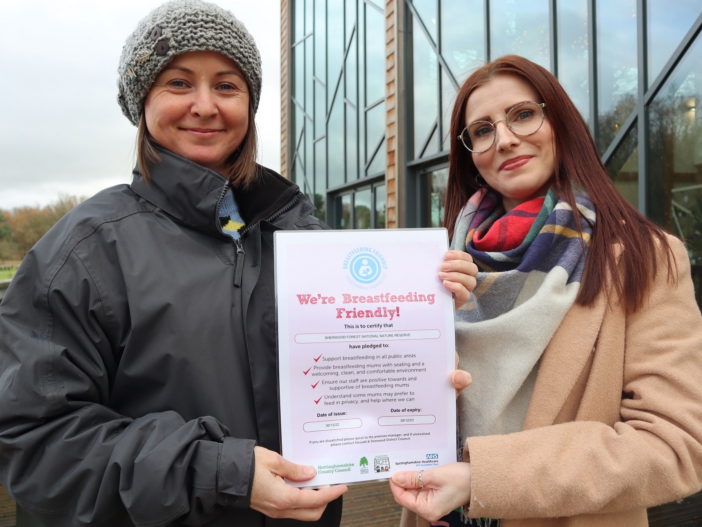Breastfeeding friendly certificate being presented to Senior Site Manager Gemma Howarth by Early Years practitioner Sami Farrand at the Sherwood Forest Visitor Centre